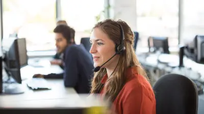 woman in a office with telephone