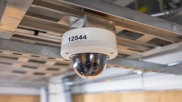 Security cameras, access control, and monitoring in a facility.