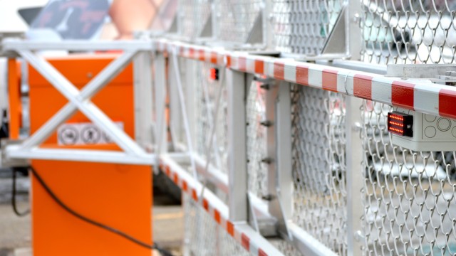 Integrated security system including intrusion detection, duress alerts, and perimeter protection for enhanced facility safety