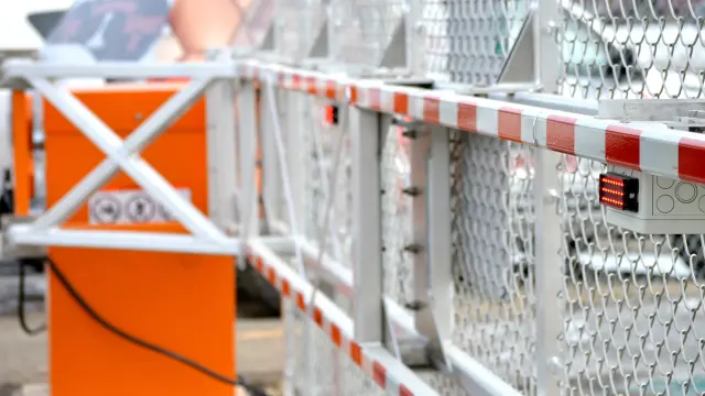 Integrated security system including intrusion detection, duress alerts, and perimeter protection for enhanced facility safety