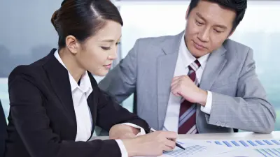 Two business people talking